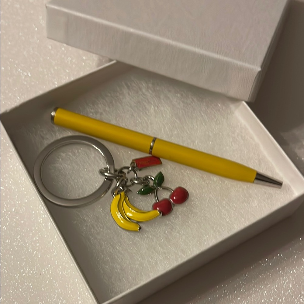 Coach Yellow Pen with Fruit Charm Keychain